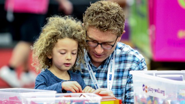 Father and daughter learning at SXSW EDU 2018.